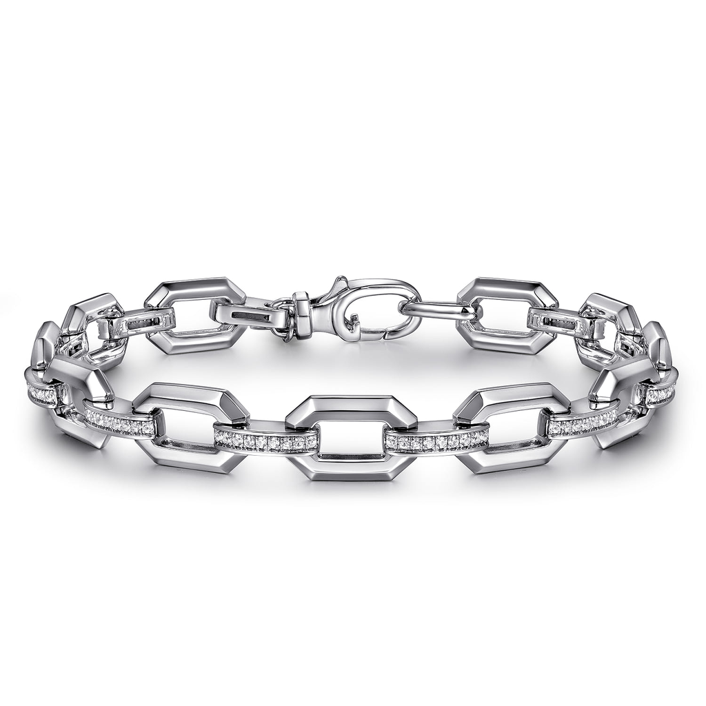 silver link bracelet with clear stones on white background