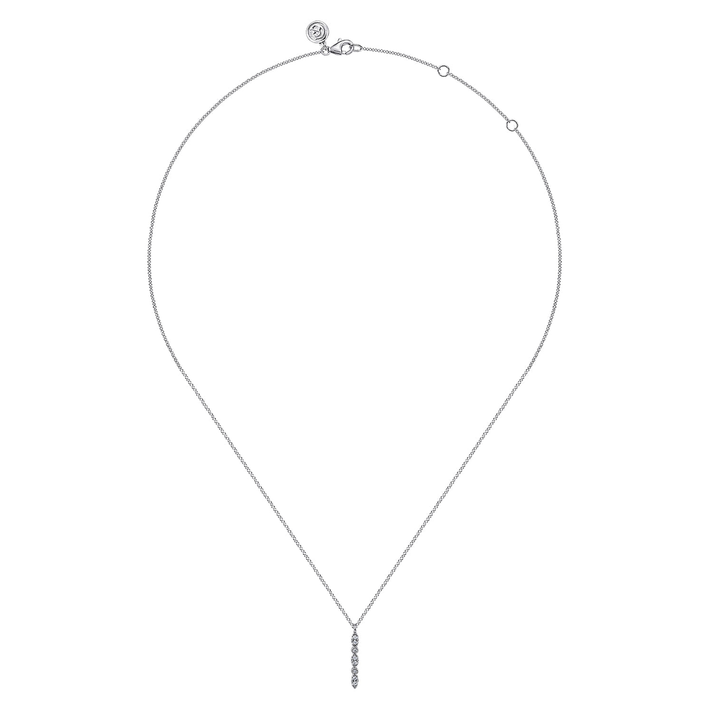 silver necklace on white background