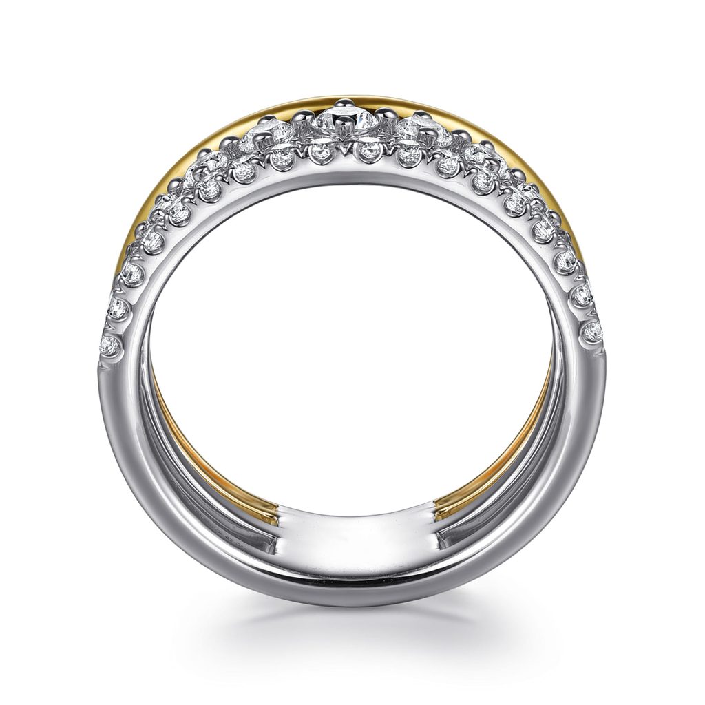 gold and silver triple band with clear stones on white background from side