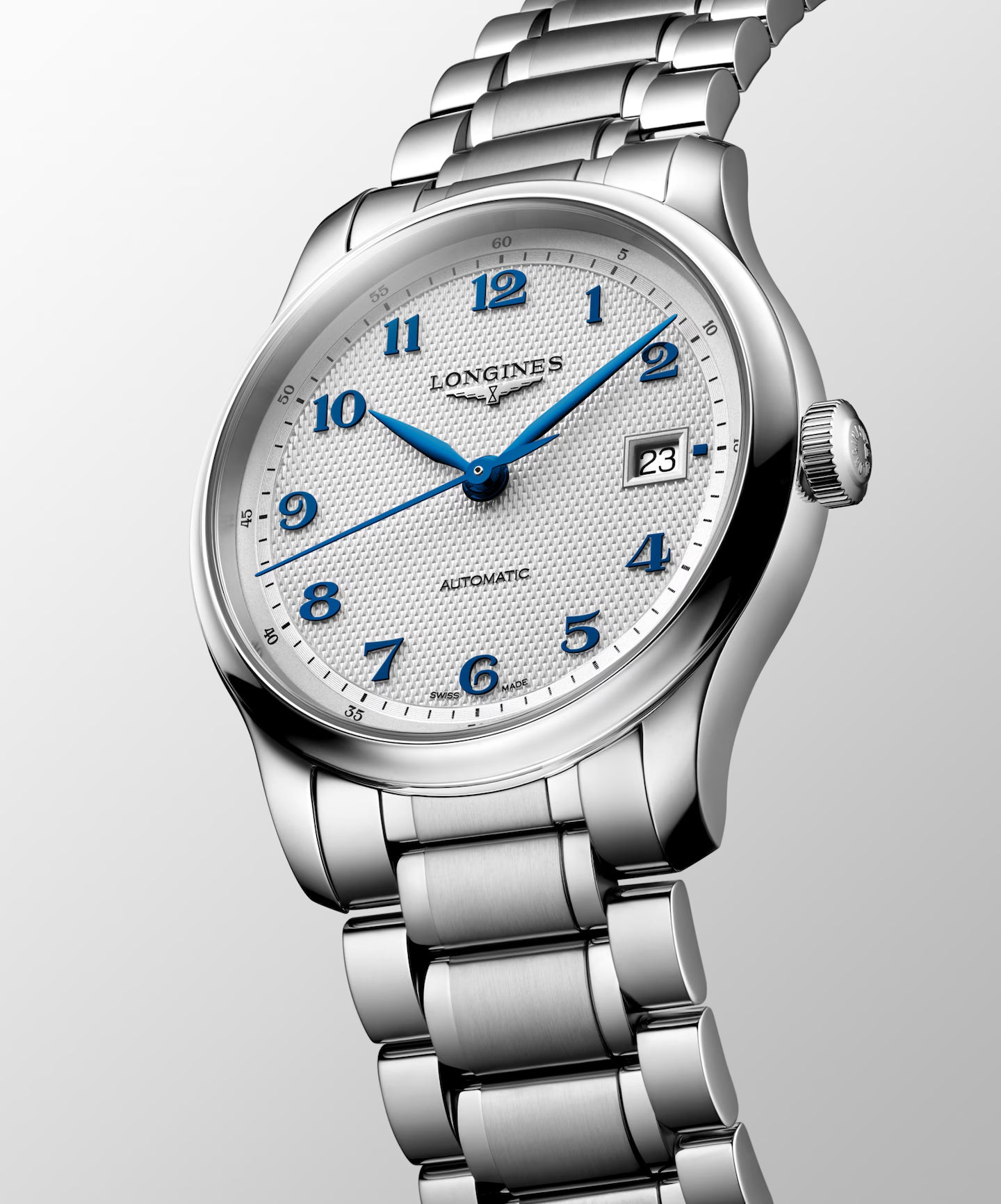 Silver watch with blue accents on a light gray background