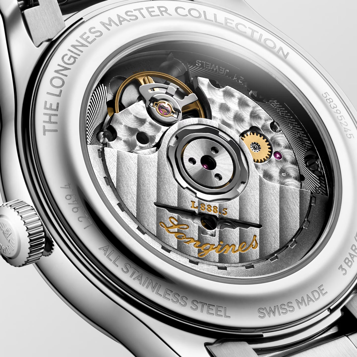 Close-up of a watch mechanism with 'Longines' branding