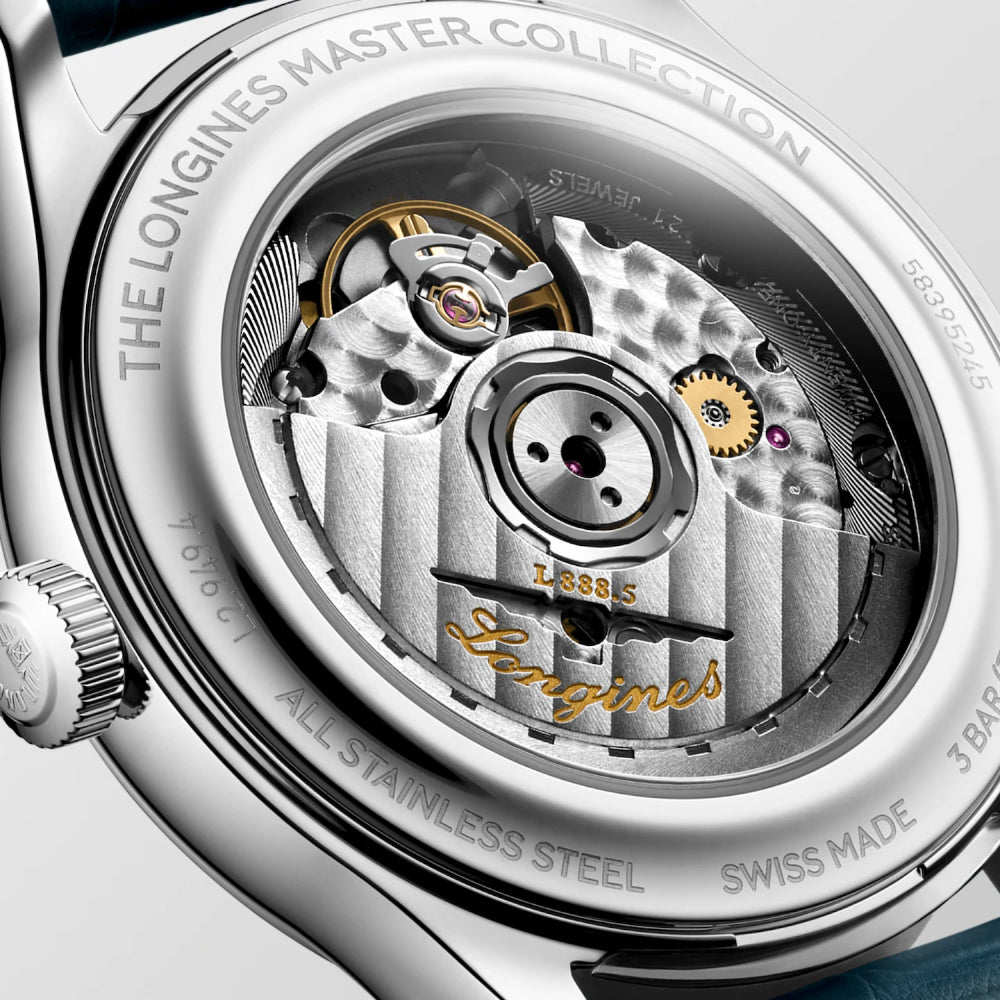 Close-up of a Longines watch mechanism with 'The Longines Master Collection' branding.