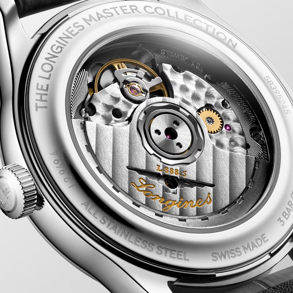Close-up of the back of a stainless steel wristwatch showing the exposed mechanical movement. The case is engraved with 'THE LONGINES MASTER COLLECTION', 'STAINLESS STEEL', 'SWISS MADE', and 'LONGINES'.