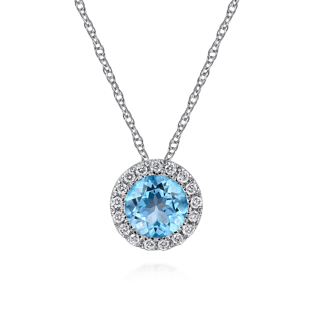 Necklace with a blue gemstone pendant on a white background
