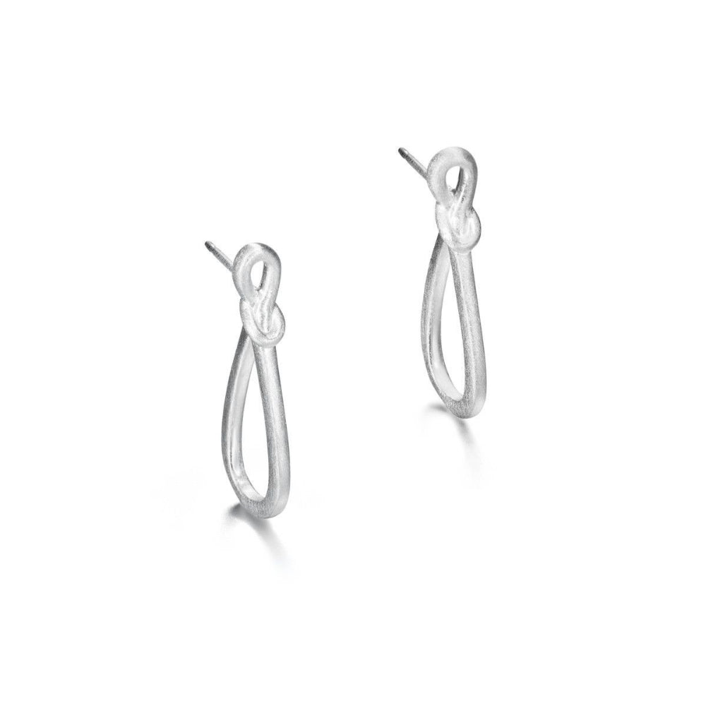 A pair of minimalist silver dangle earrings with a looped infinity symbol design, shown on a clean white background.