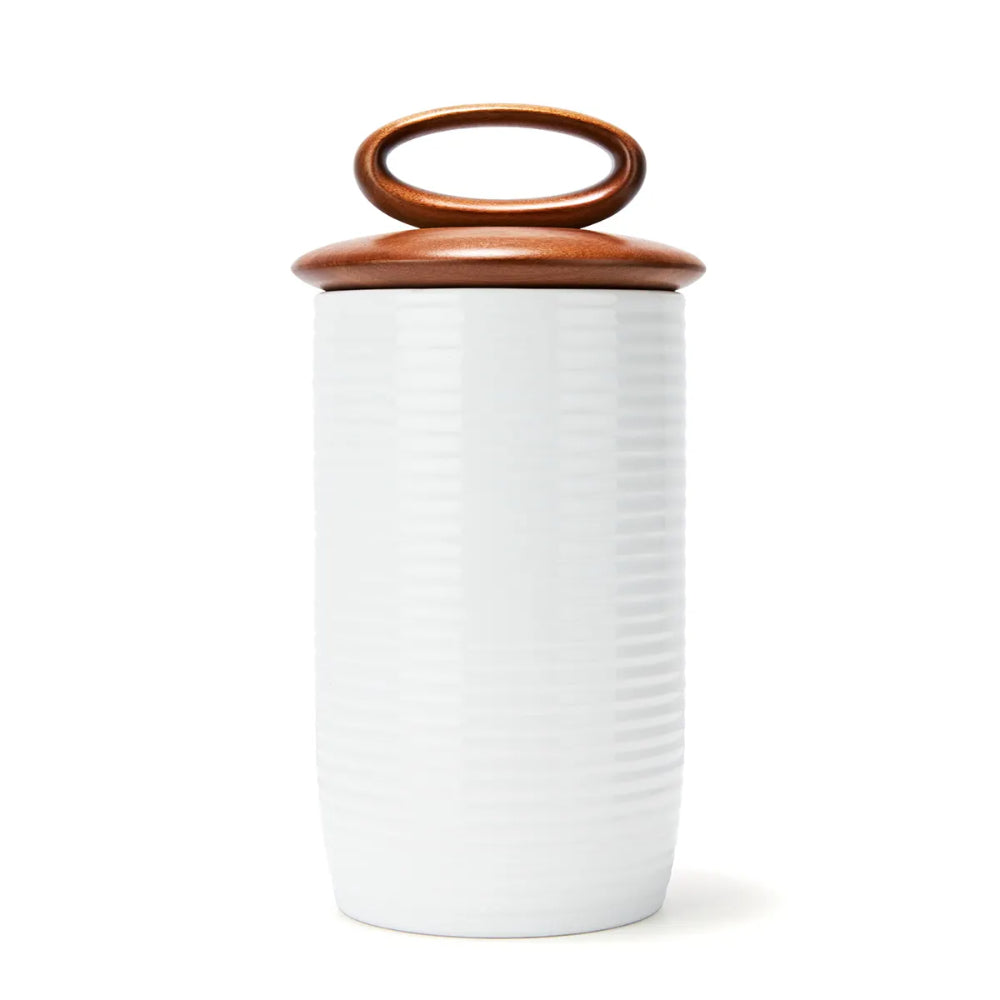 White cylindrical container with a brown lid on a white background (large)