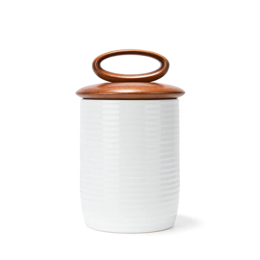 White ceramic jar with a brown lid on a white background (medium)