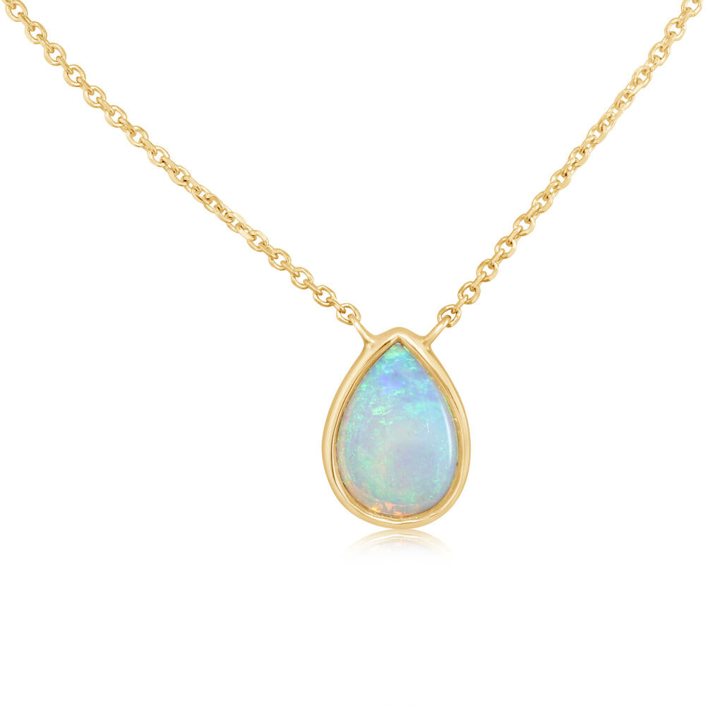 Gold necklace with a teardrop-shaped opal pendant on a white background