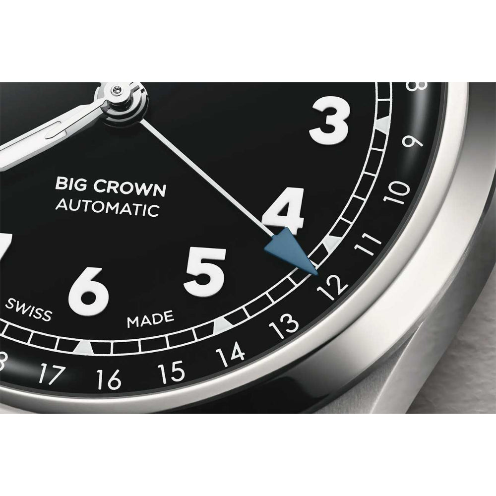 Close-up of a watch face with 'Big Crown' branding on a black background