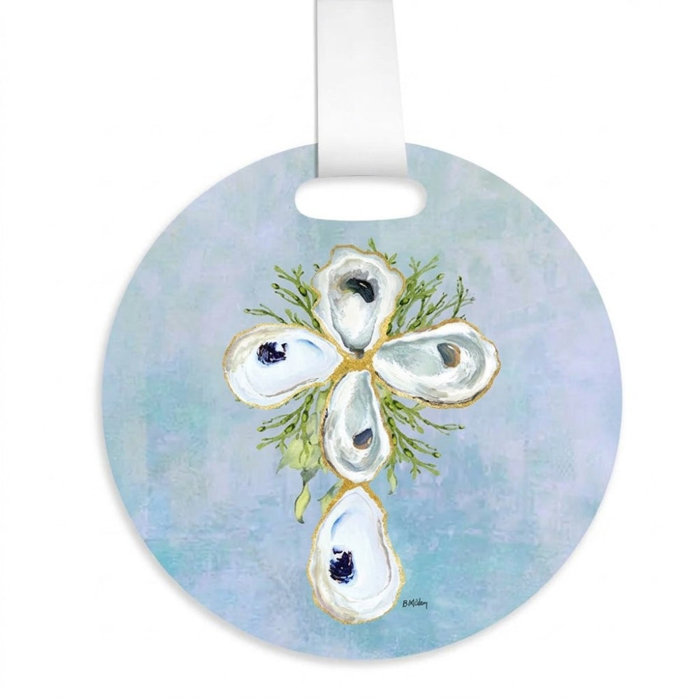 Round luggage tag featuring a painted oyster cluster design on a light blue textured background with a white hanging loop.