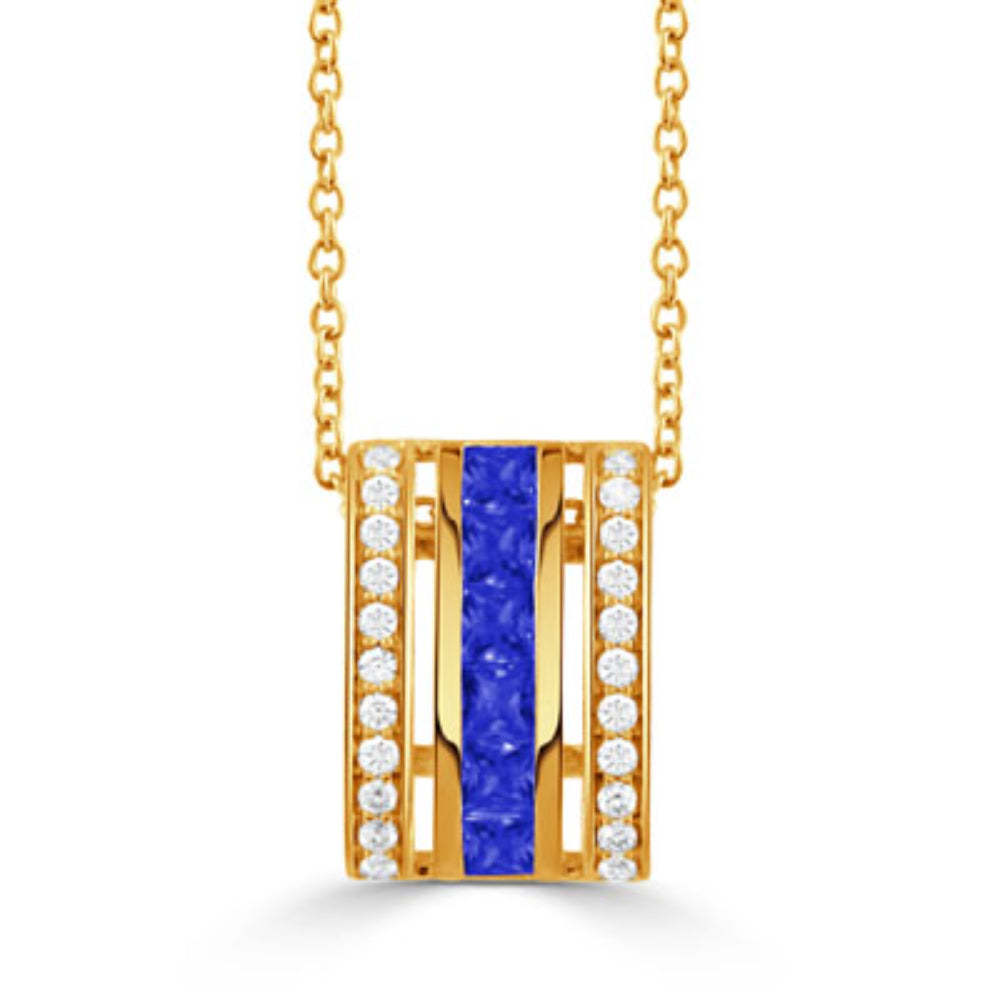A gold rectangular pendant necklace featuring a central vertical channel of deep blue lapis lazuli stones, flanked by side bars set with small clear round-cut stones, suspended from a gold chain on a white background.