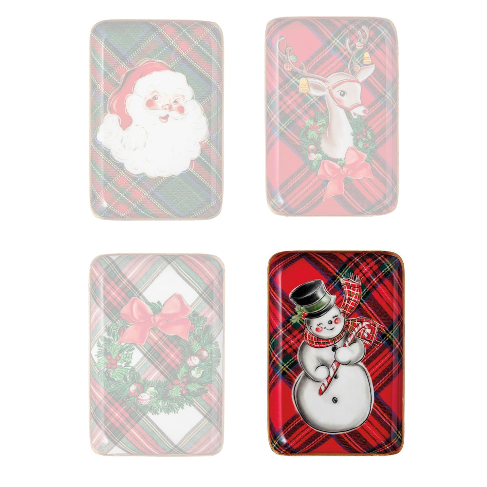 Four Christmas-themed tins with Santa, reindeer, wreath, and snowman designs on a white background.