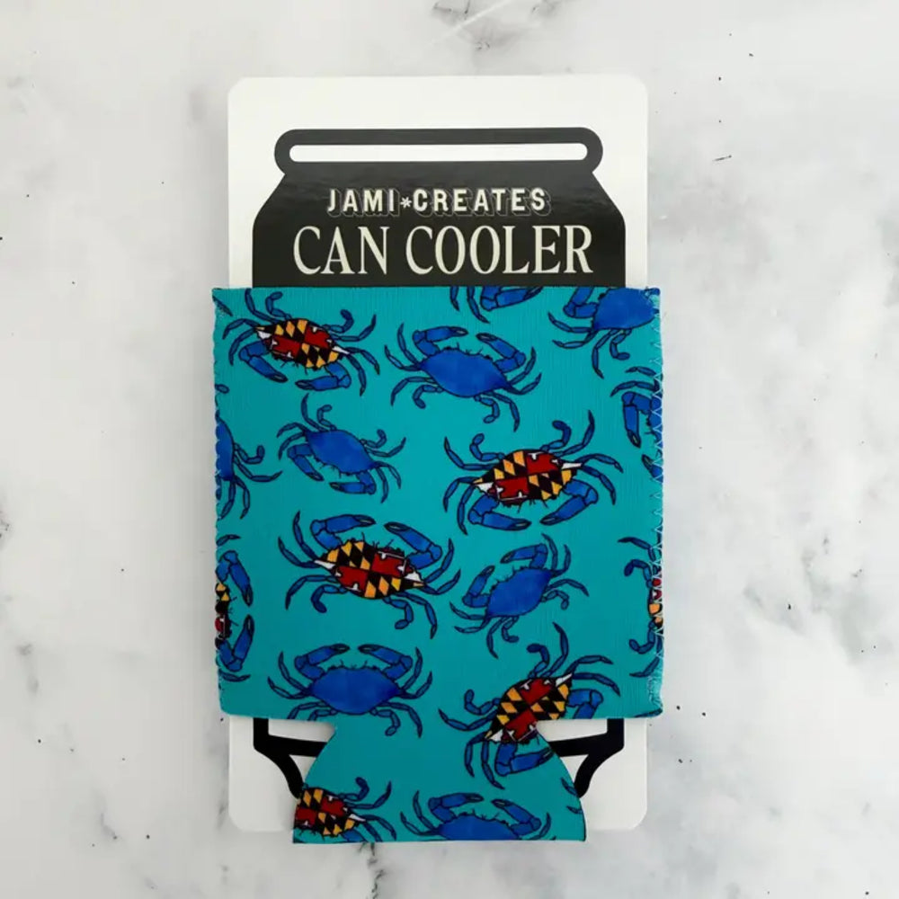 Can cooler with blue crab pattern on a white background
