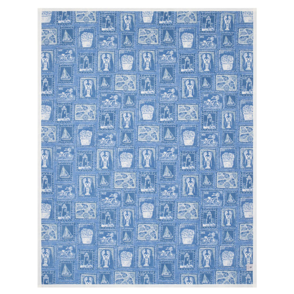Blue blanket with white pattern of icons or symbols on a white background