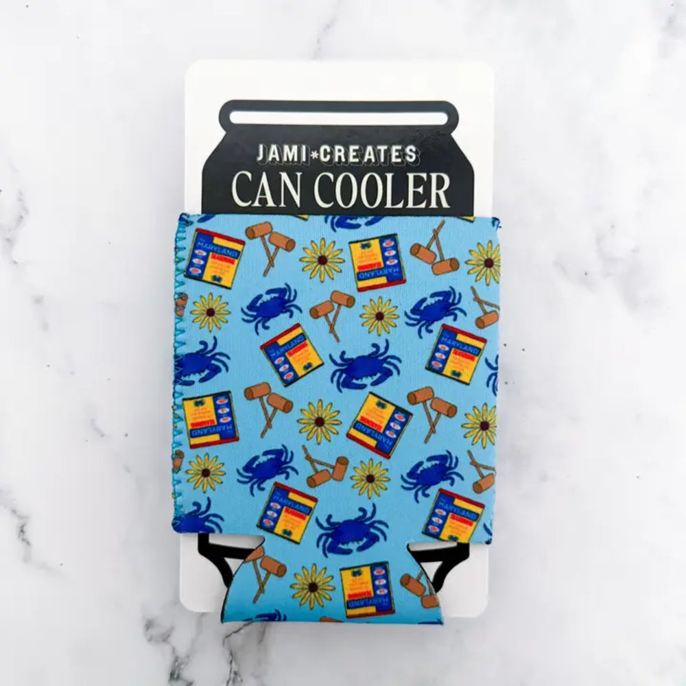 Can cooler with blue pattern on a white marble background