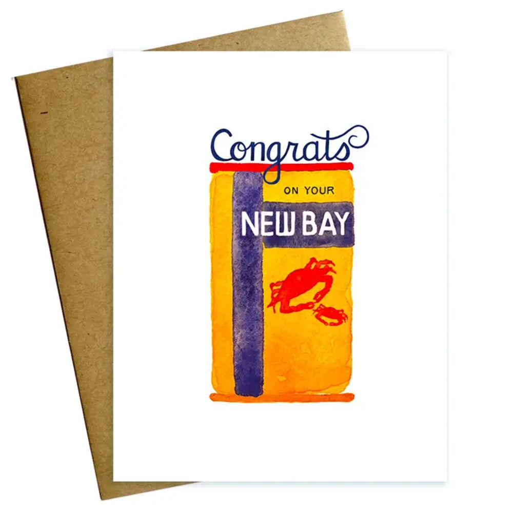 Greeting card with a New Bay brand packaging design and 'Congrats on your New Bay' text.