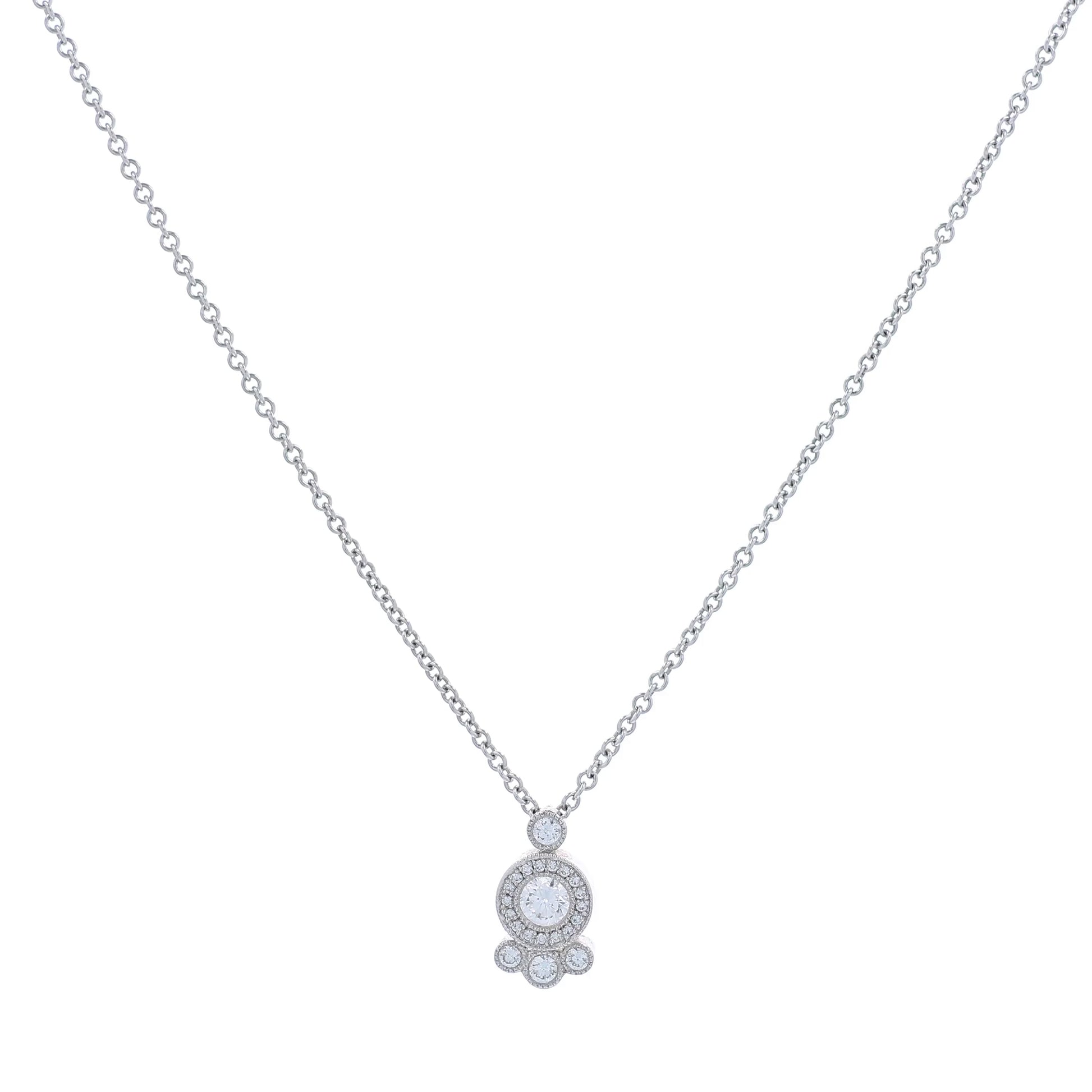 White gold abstract shape diamond halo pendant necklace on a white background