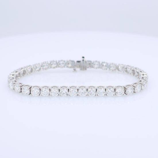 White gold 14.43 carat diamond tennis bracelet graded HSI on a white background