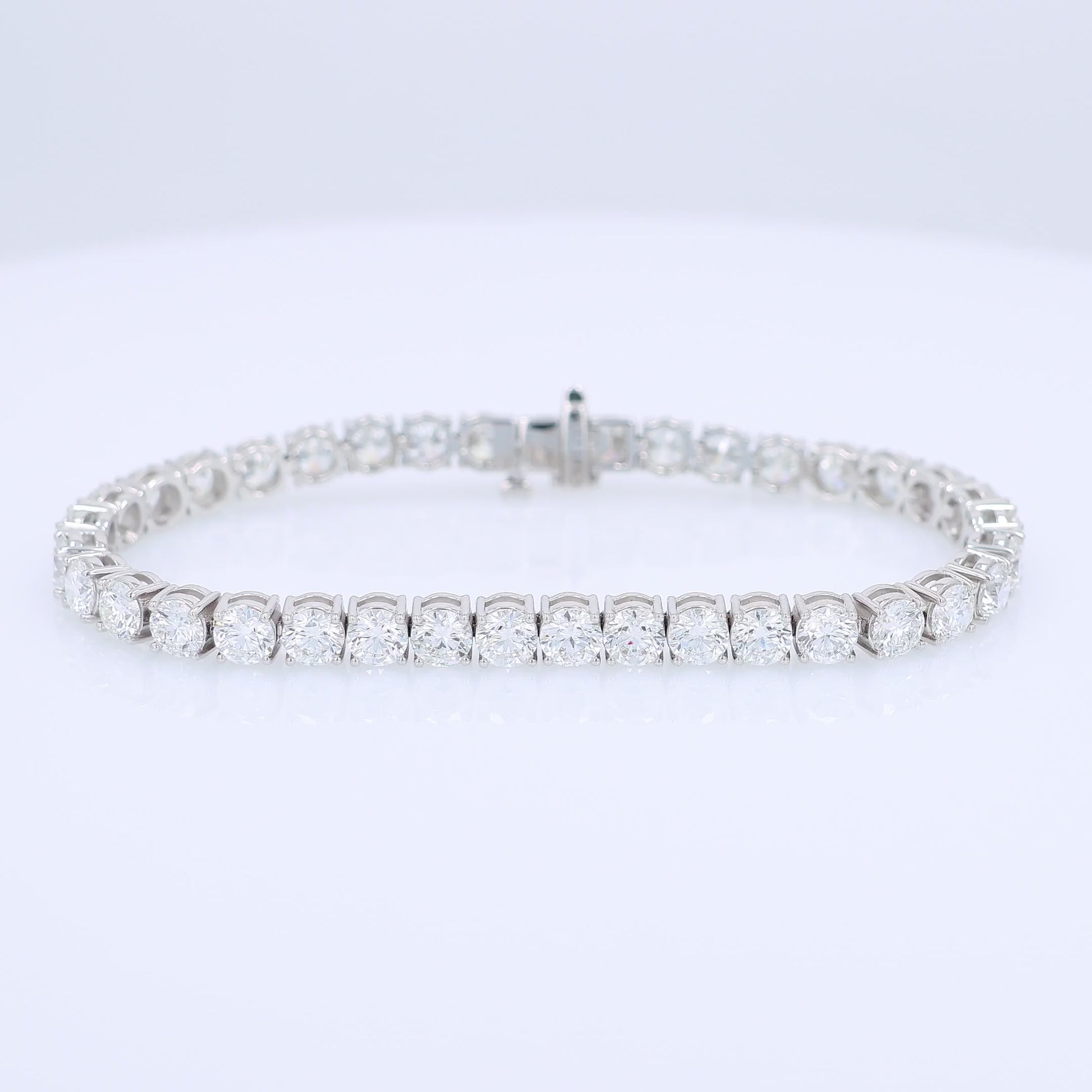 White gold 14.43 carat diamond tennis bracelet graded HSI on a white background