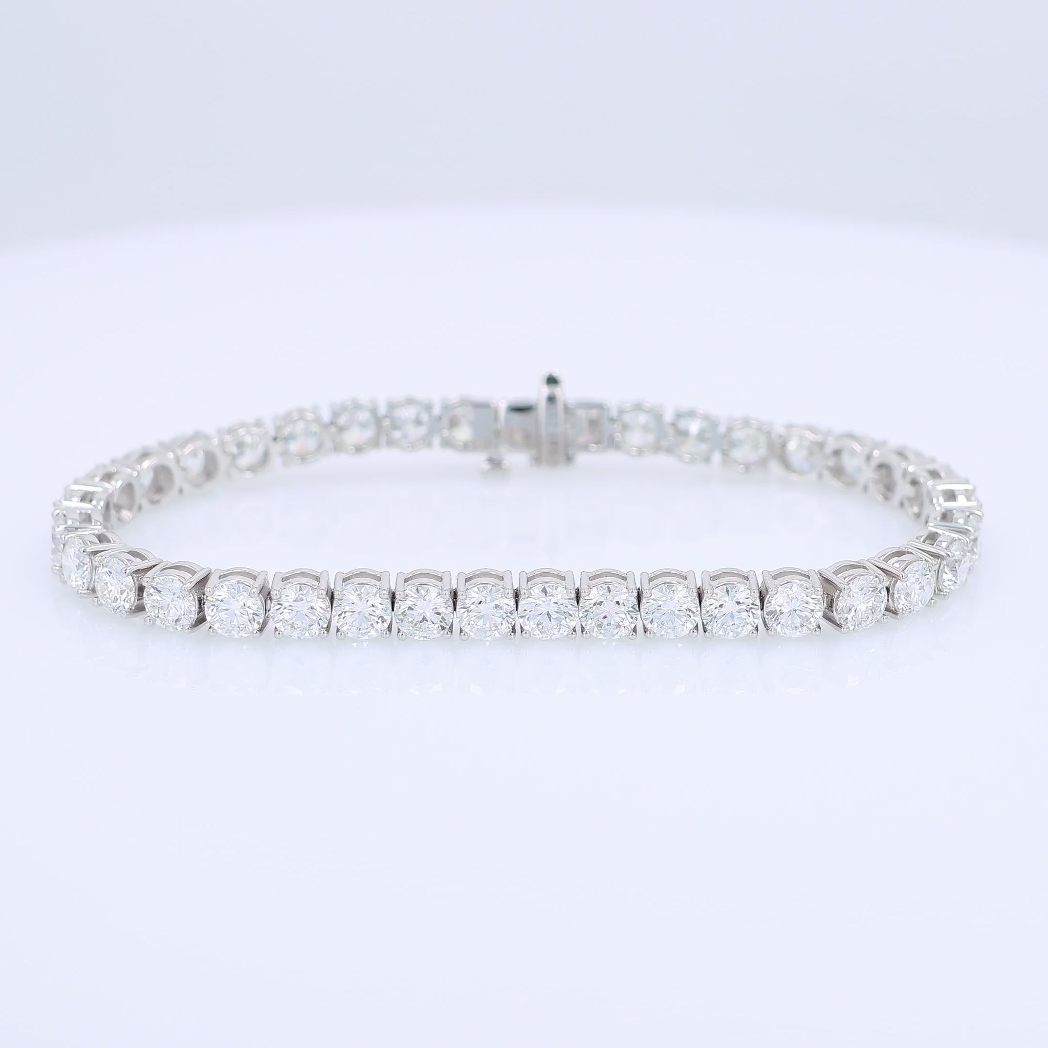 White gold 14.43 carat diamond tennis bracelet graded HSI on a white background
