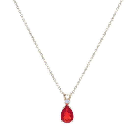 Yellow gold pear shape fire opal and diamond pendant necklace on a white background