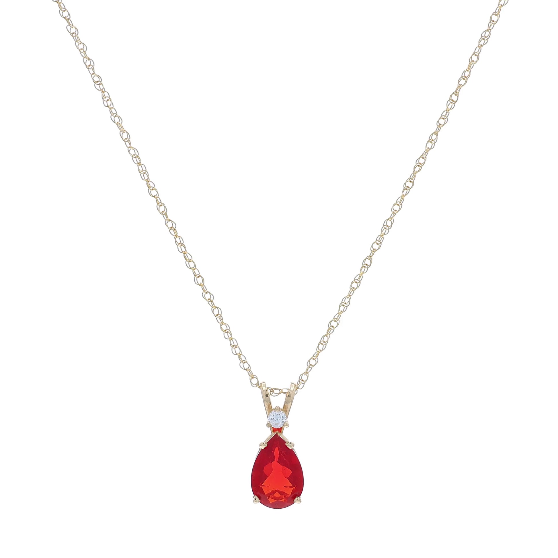 Yellow gold pear shape fire opal and diamond pendant necklace on a white background