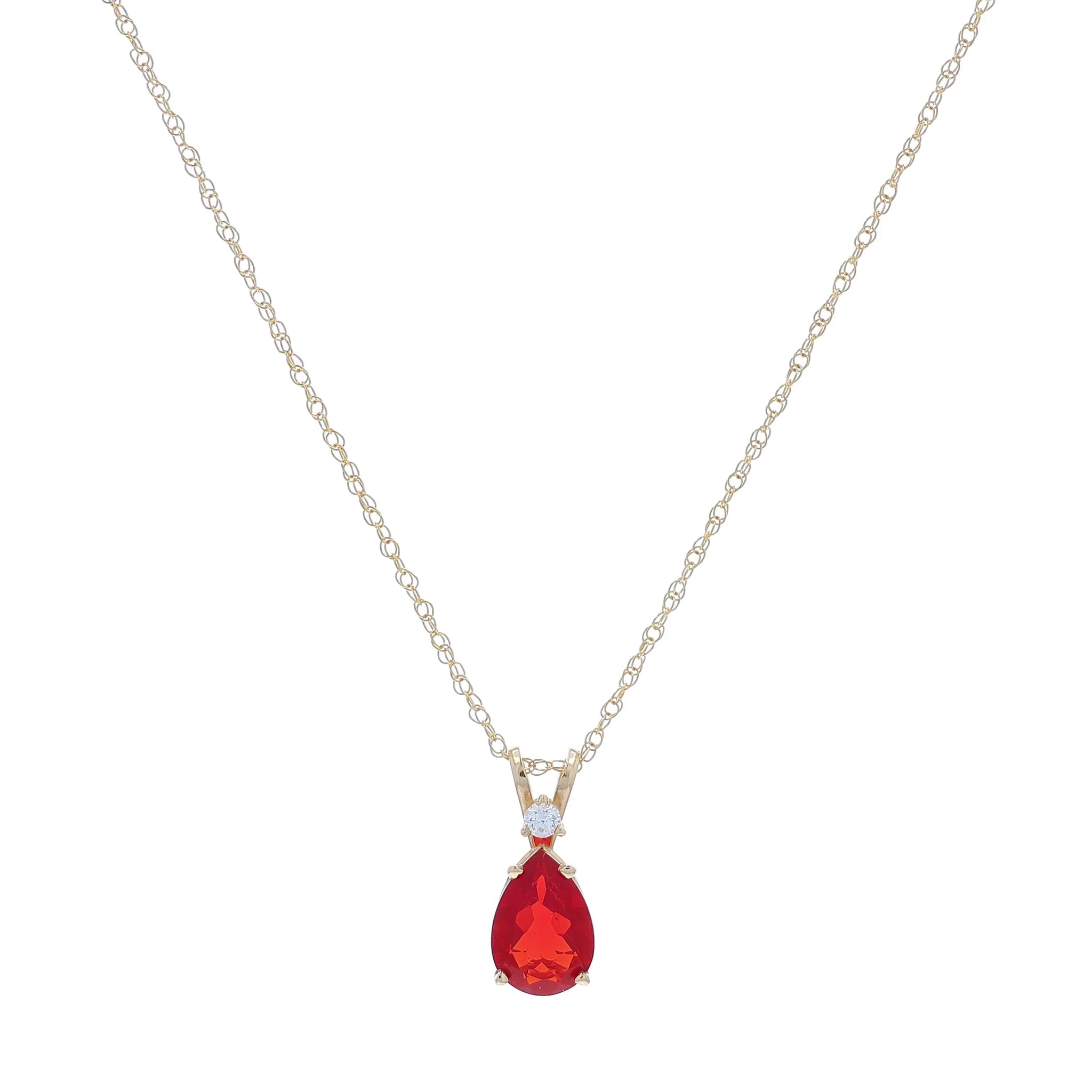 Yellow gold pear shape fire opal and diamond pendant necklace on a white background