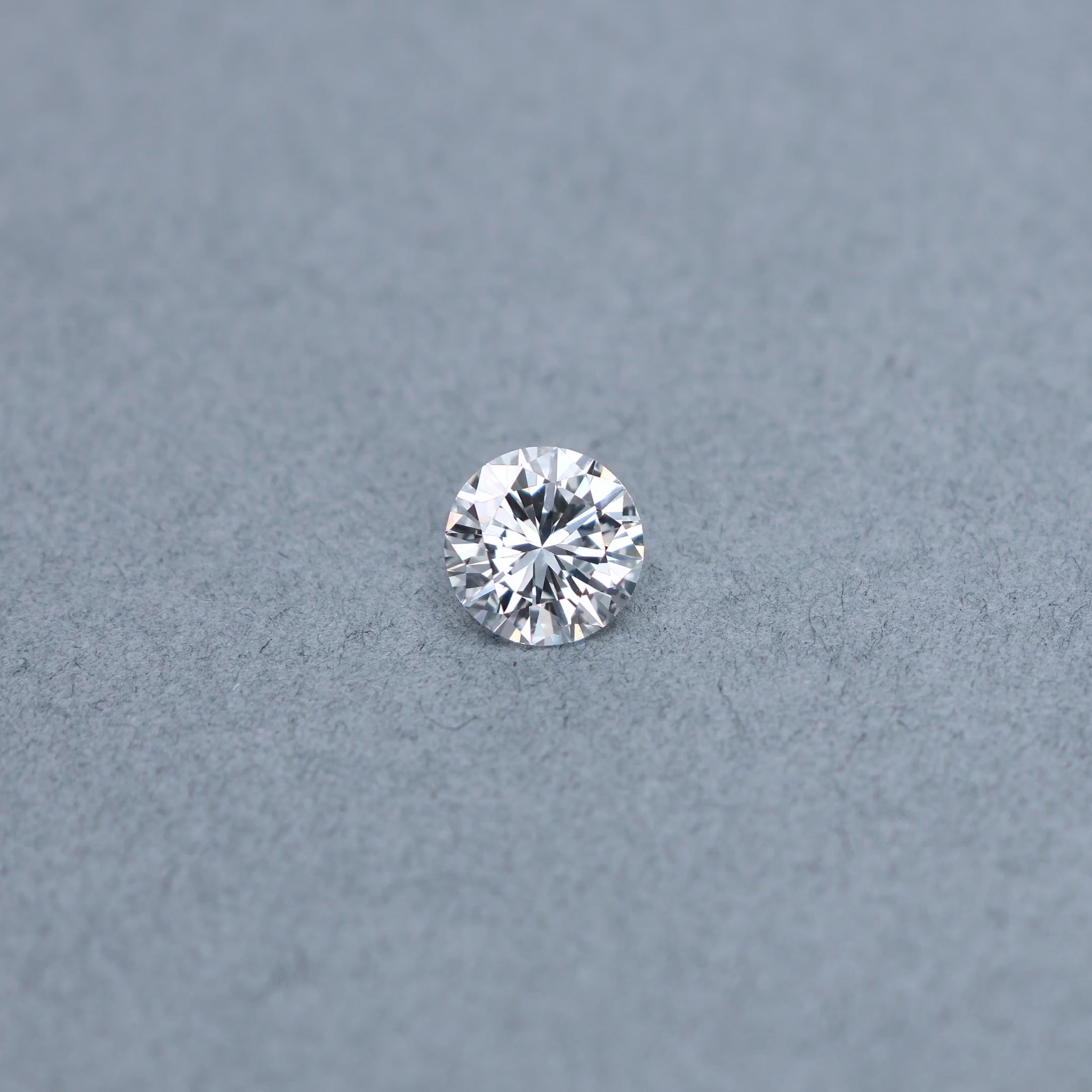 Round 1.90 carat diamond graded DVS1 on a grey background