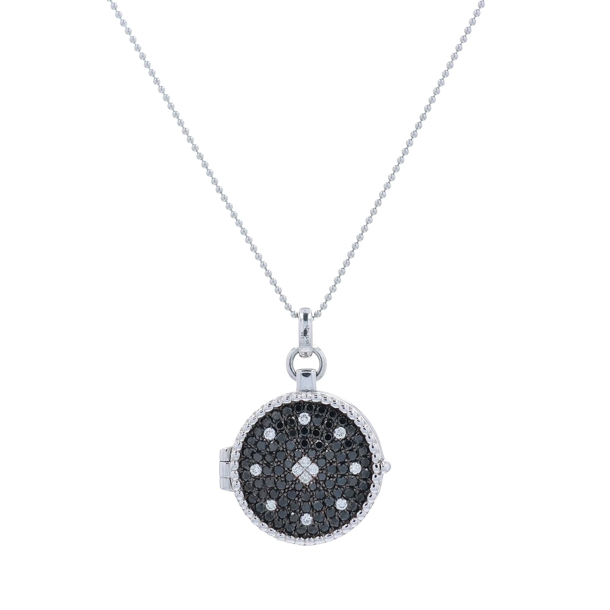 White gold white and black diamond pave locket necklace on a white background