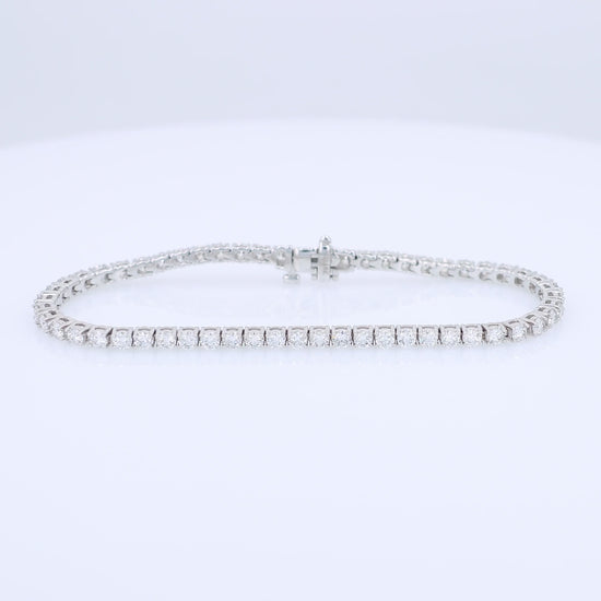 White gold 4.48 carat diamond tennis bracelet on a white background