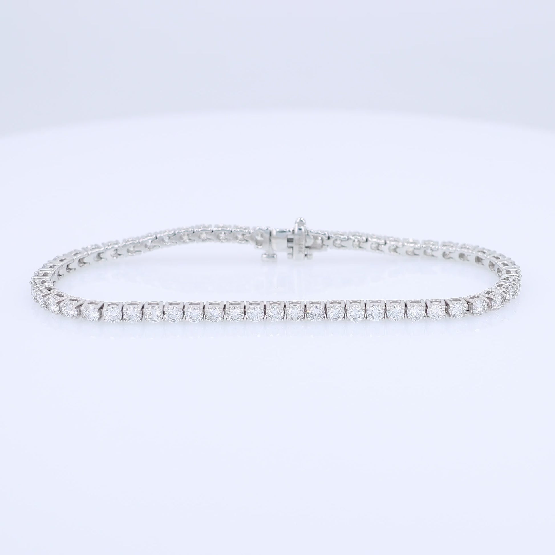White gold 4.48 carat diamond tennis bracelet on a white background