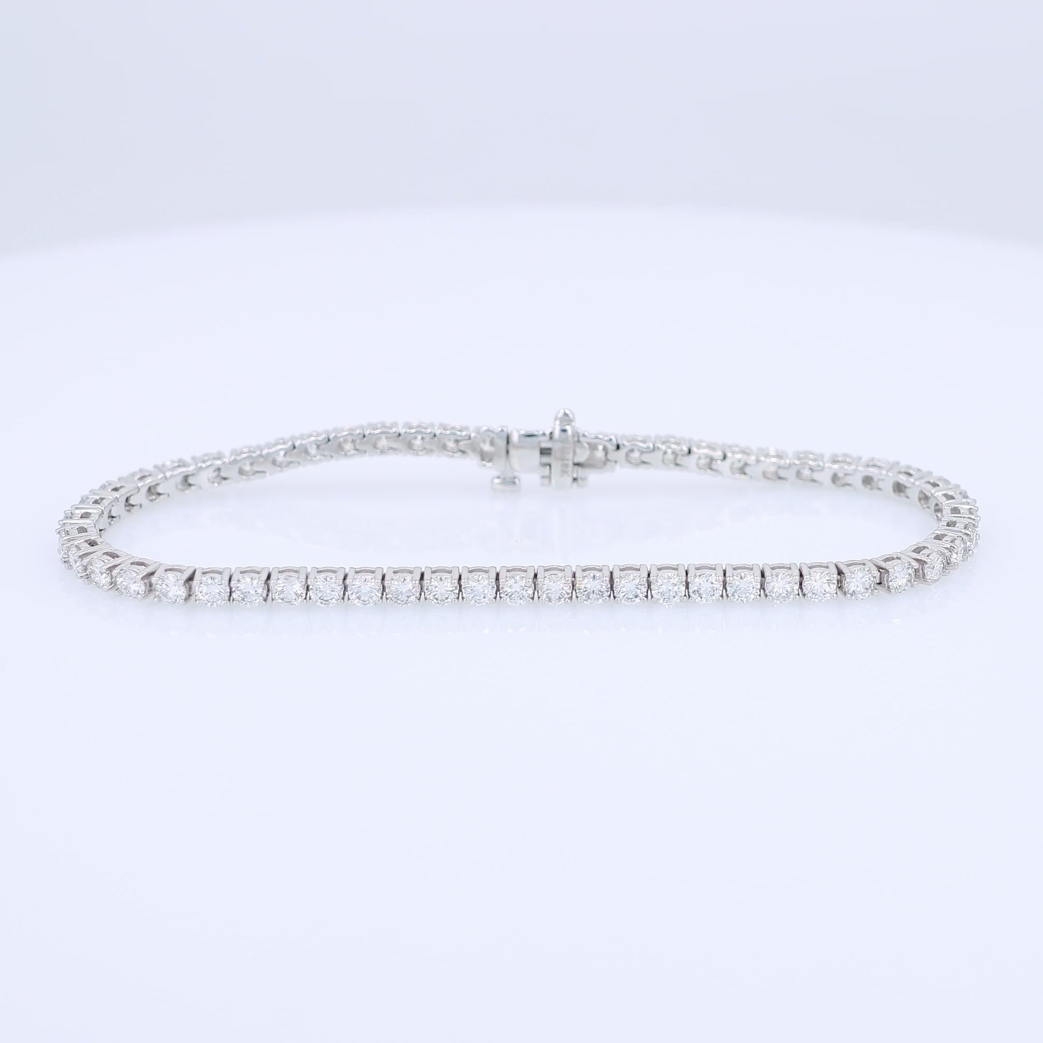 White gold 4.48 carat diamond tennis bracelet on a white background