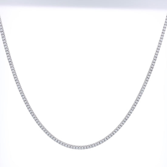 White gold 5.85 carat straight diamond tennis necklace graded HSI on a white background