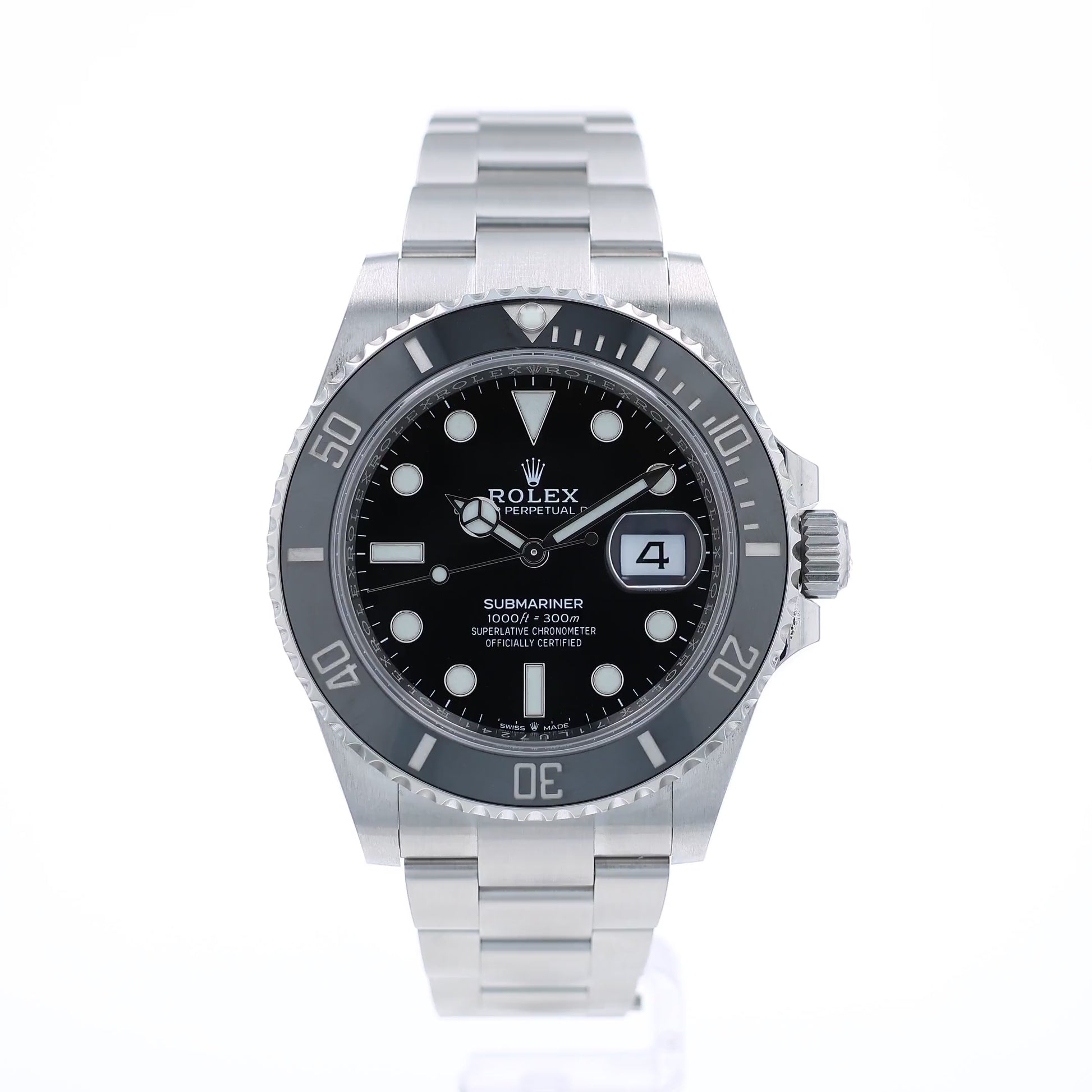 Back angle of a Rolex Submariner watch with a black dial and ceramic bezel on a white background