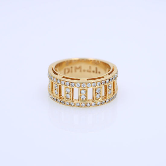 Yellow gold DiModolo branded fence link design diamond wedding band on a white background