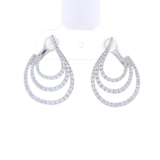 White gold 3 row diamond earrings on a white background
