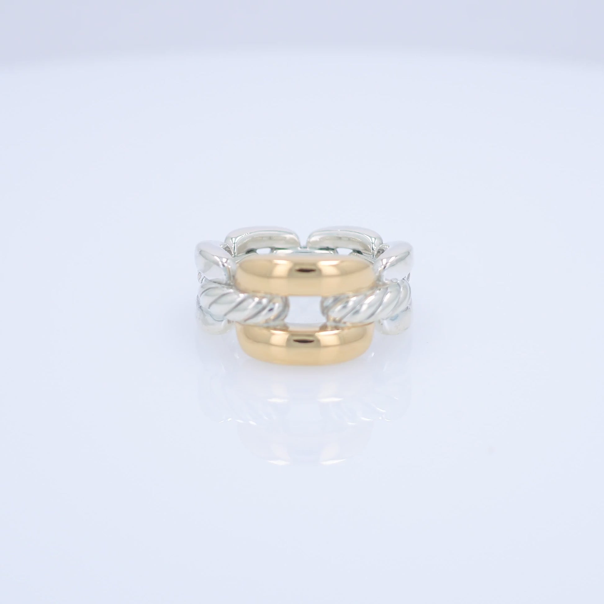 David Yurman two-tone silver and gold chain link design ring on a white background