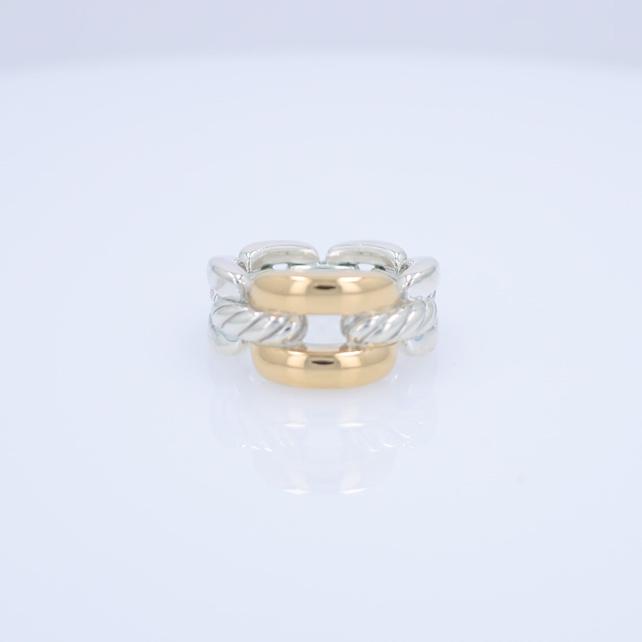 David Yurman two-tone silver and gold chain link design ring on a white background