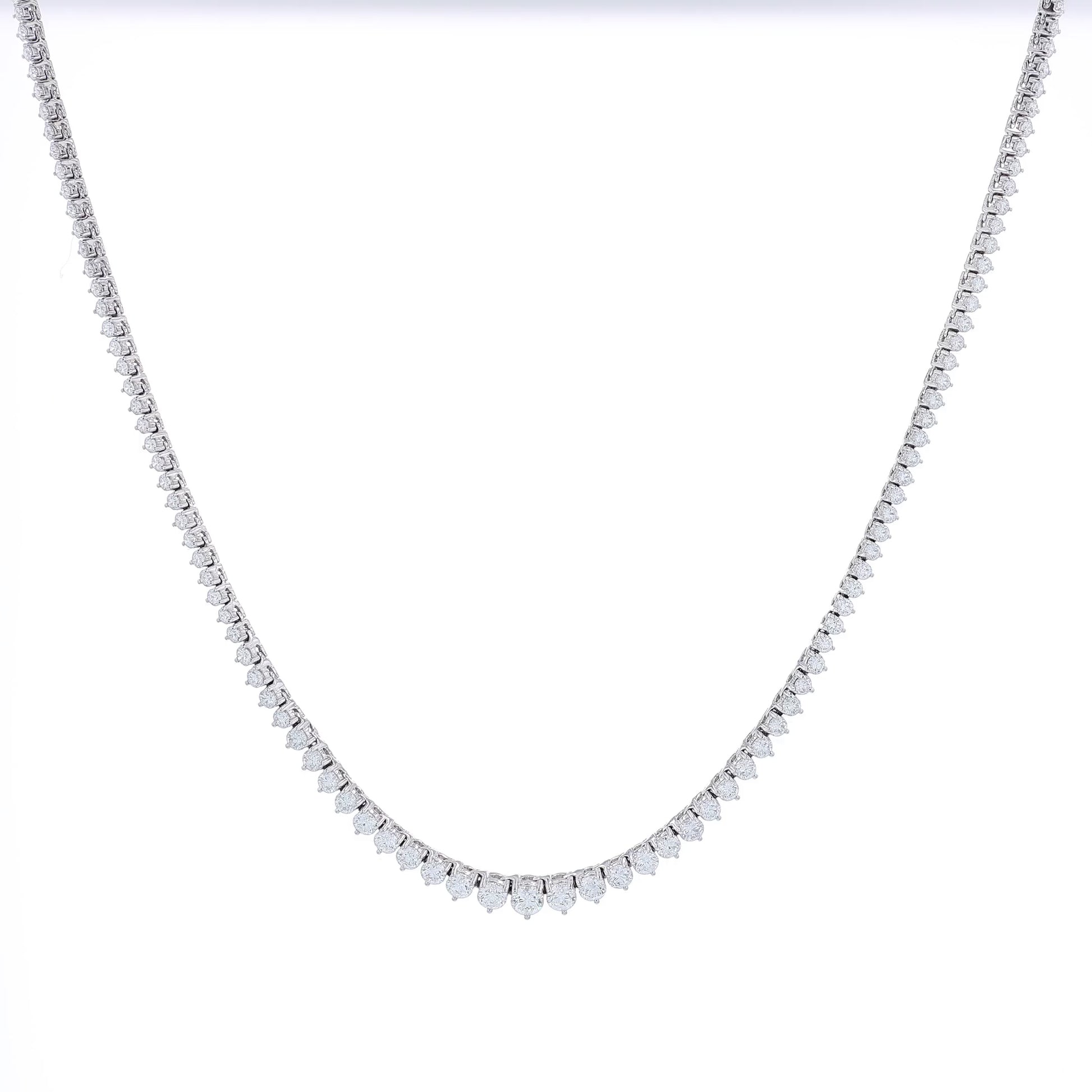 White gold 6.82 carat graduated diamond necklace on a white background
