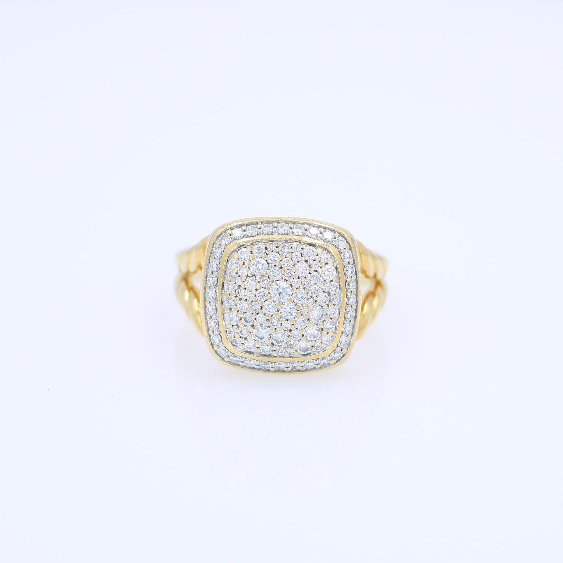 David Yurman yellow gold split cable shank pave top diamond ring on a white background