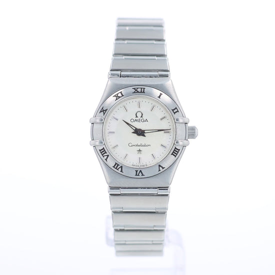 360 degree video of a silver Omega watch with a white dial and a roman numeral bezel on a white background