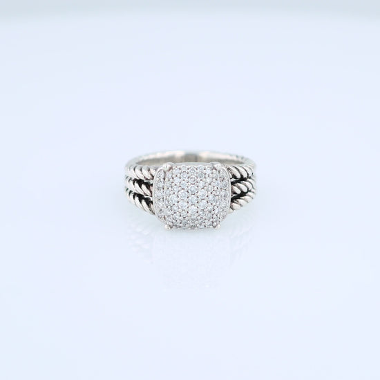David Yurman silver split shank cable design ring with a pave diamond cushion center on a white background