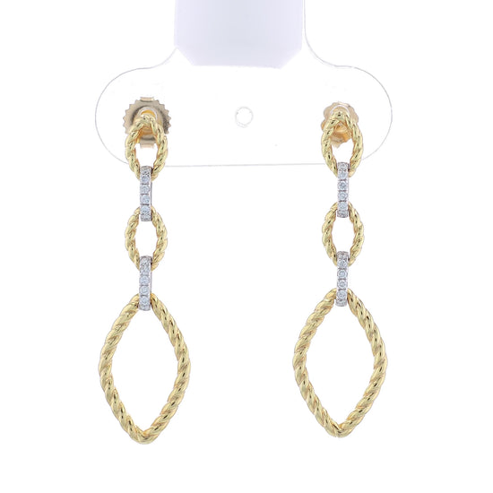 Gold twist link drop earrings with diamond accents on a white background