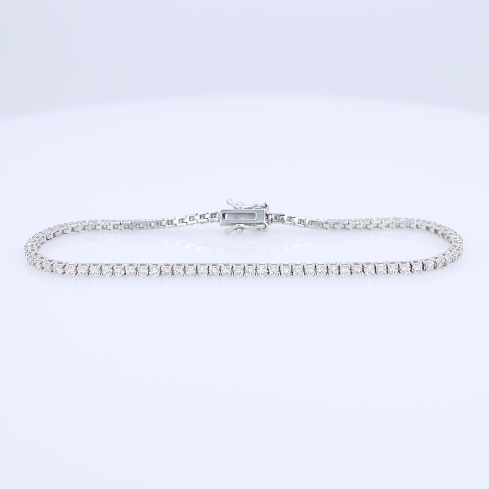 White gold 2.00 carat diamond tennis bracelet on a white background