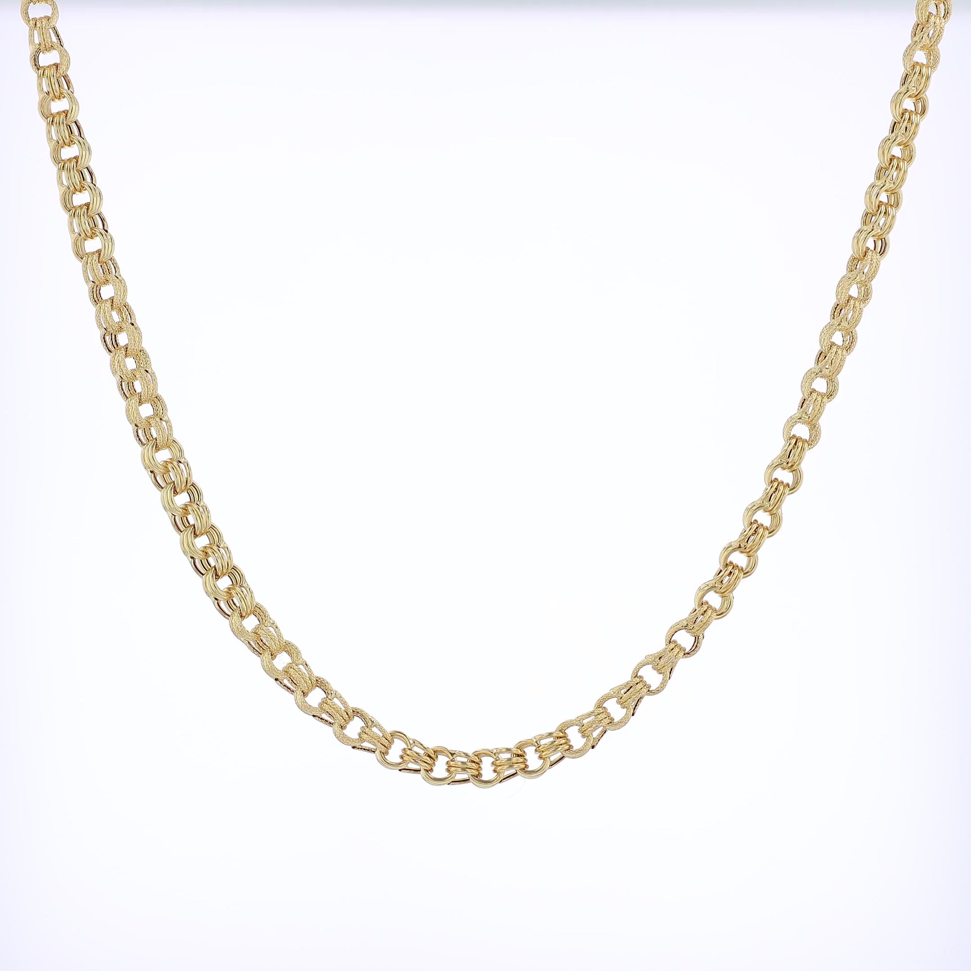 Yellow gold garbaldi link chain necklace on a white background