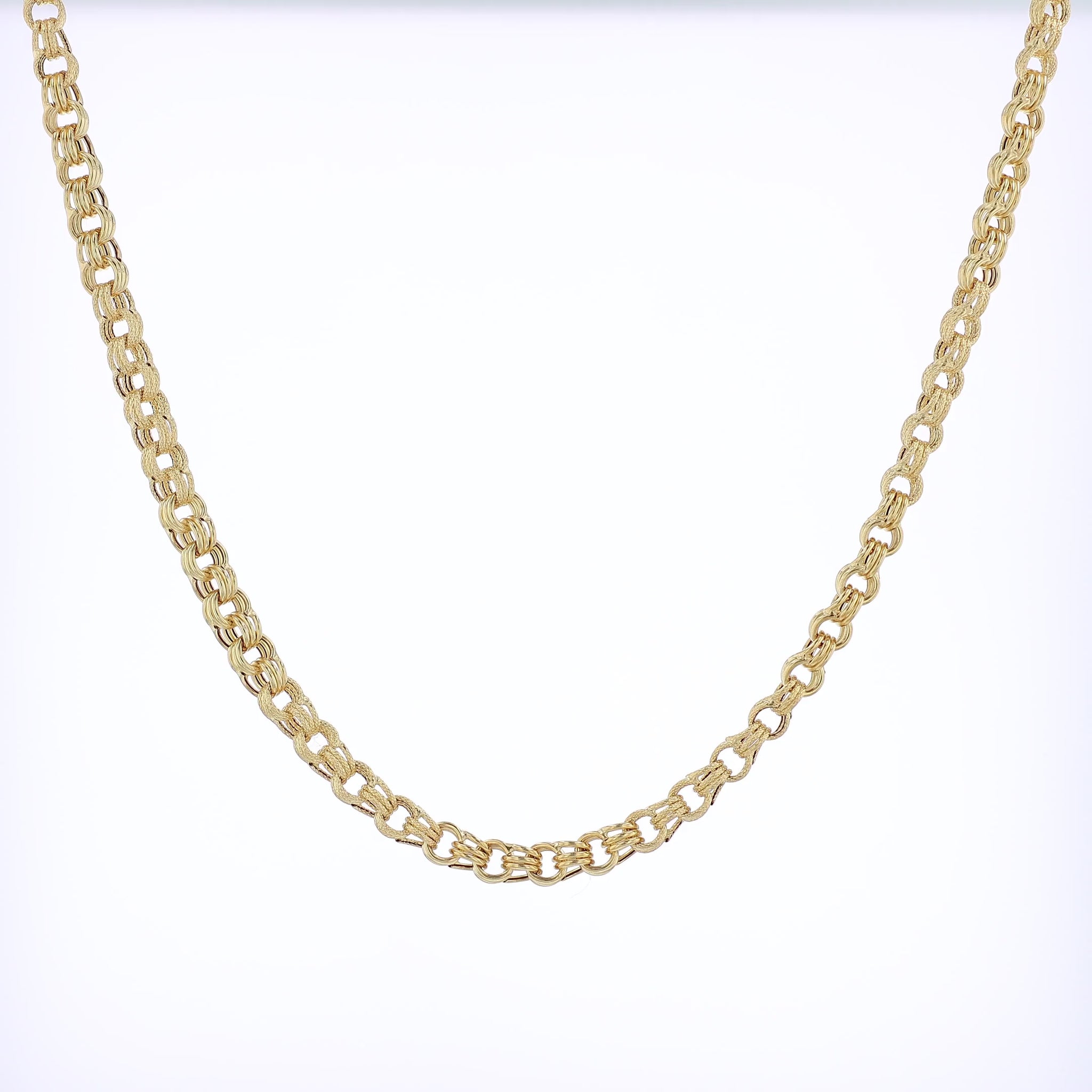 Yellow gold garbaldi link chain necklace on a white background