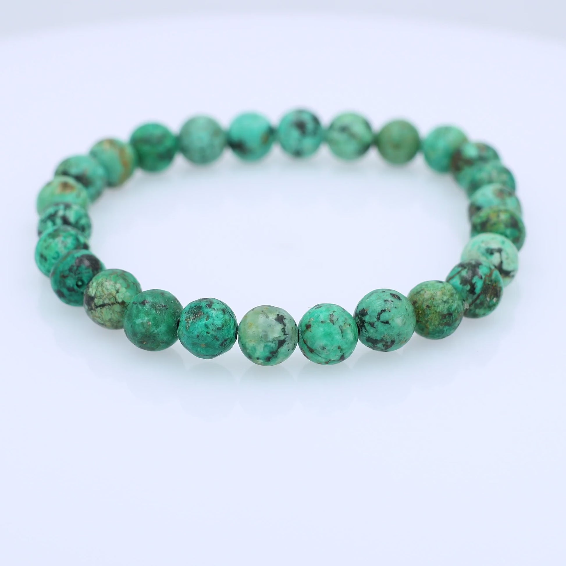 Beaded Turquoise Bracelet spinning on a white background