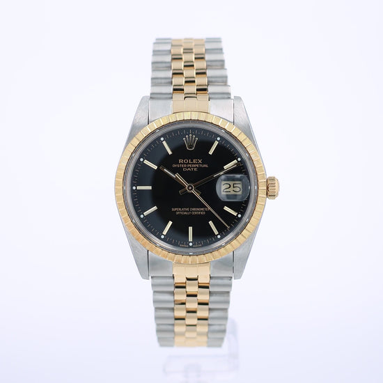 360 degree video of a steel and Yellow Gold Rolex watch with black dial on a white background