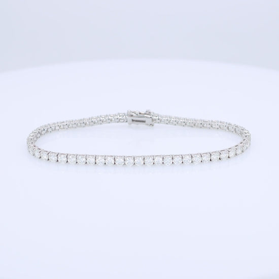 White gold 5.74 carat diamond tennis bracelet on a white background