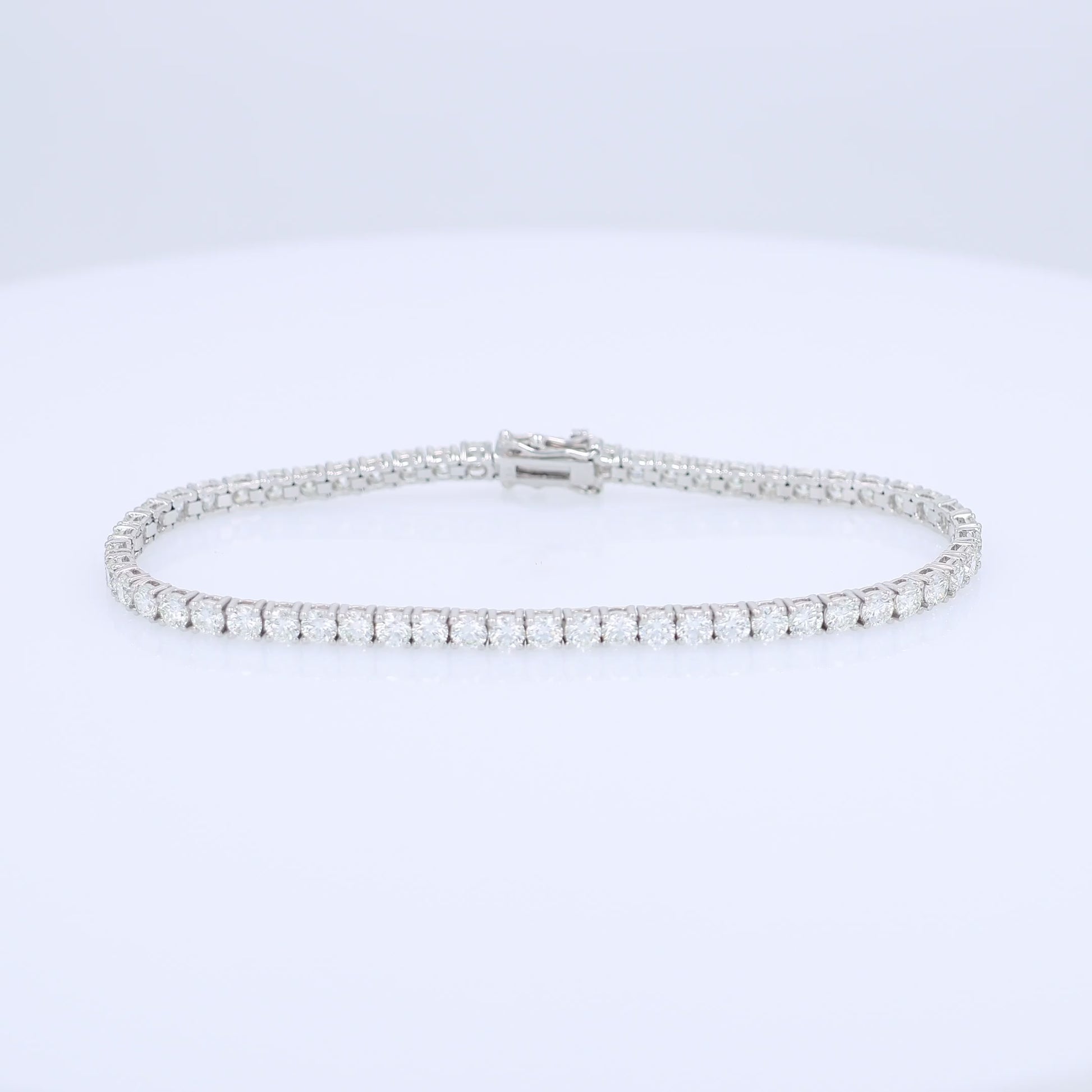 White gold 5.74 carat diamond tennis bracelet on a white background